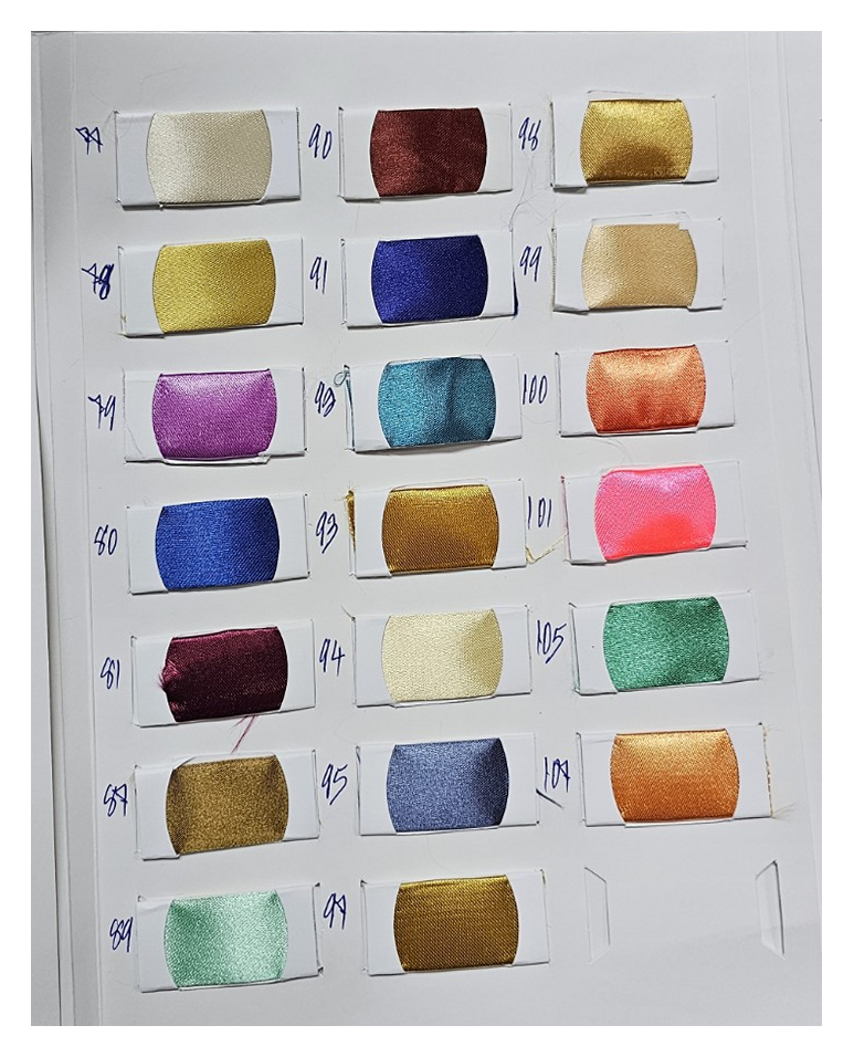 Crepe satin color chart page 4 with original fabric swatches and handwritten color codes / ตารางสีผ้าเครปซาตินหน้า 4